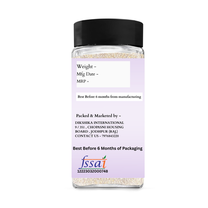 Clear spice jar with black lid and purple label on a white background