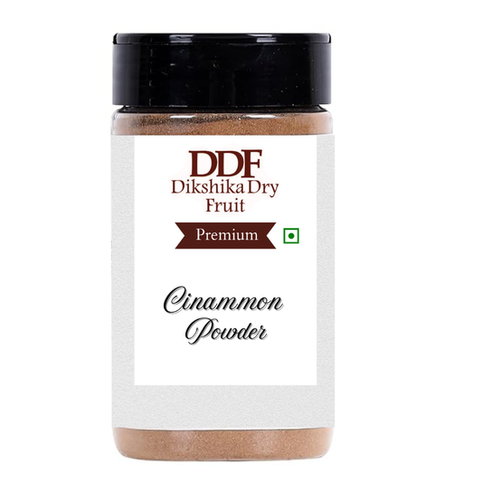Jar of Dikshika Dry Fruit Premium Cinnamon Powder on a white background