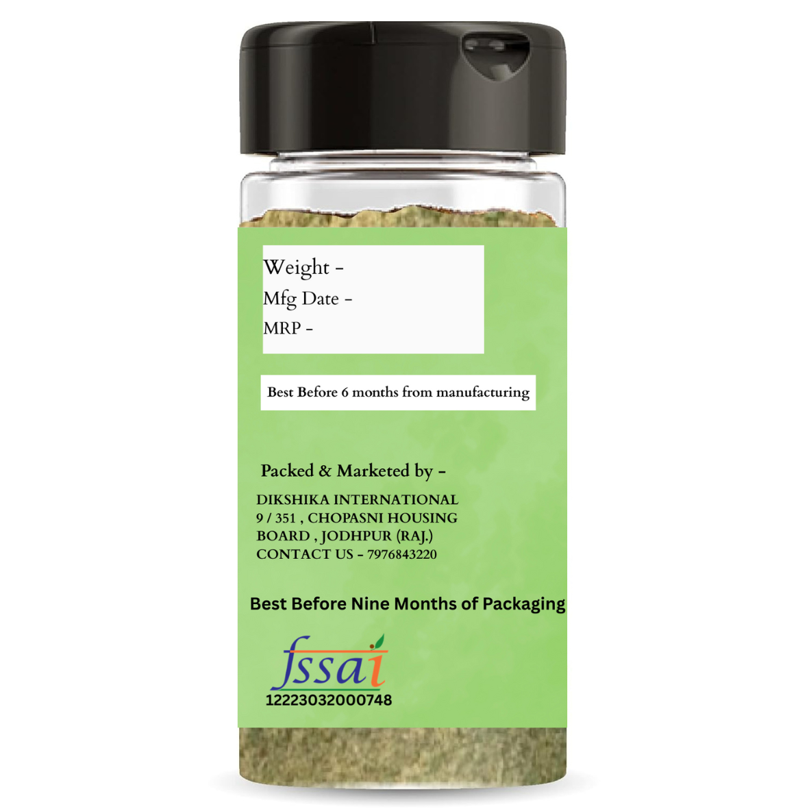 Spice jar with green label and black lid on a white background